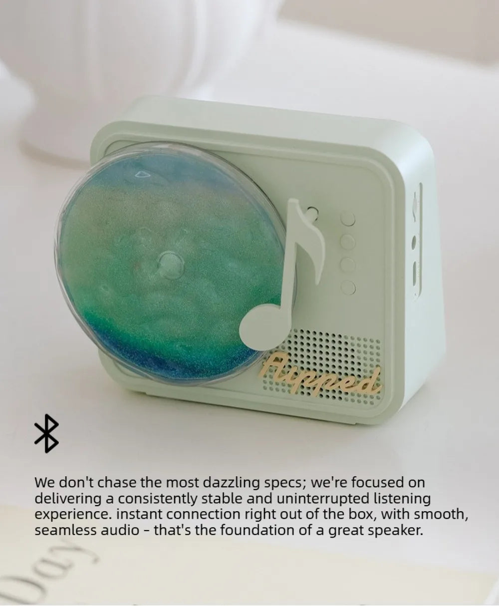 Quicksand Glow Speaker — Rotating Bluetooth Speaker & Night Light